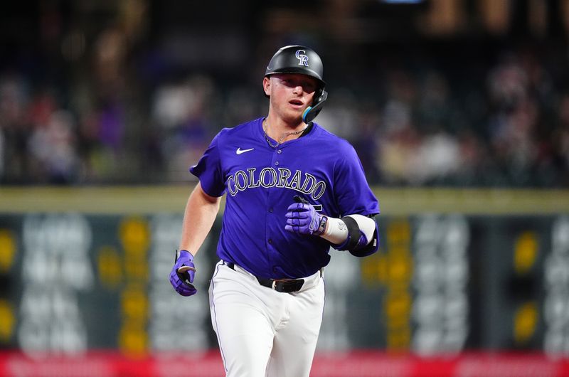 Sep 17, 2024; Denver, Colorado, USA; Colorado Rockies outfielder Hunter Goodman (15) runs off a solo home run in the eighth inning against the Arizona Diamondbacks at Coors Field. Mandatory Credit: Ron Chenoy-Imagn Images