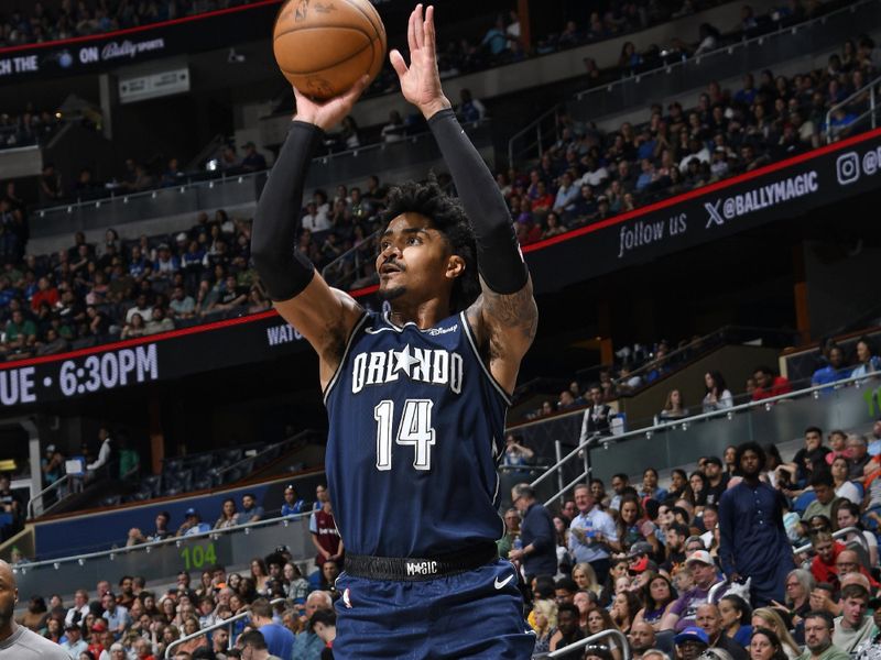 ORLANDO, FL - MARCH 17: Gary Harris #14 of the Orlando Magic shoots the ball during the game against the Toronto Raptors on March 17, 2024 at the Kia Center in Orlando, Florida. NOTE TO USER: User expressly acknowledges and agrees that, by downloading and or using this photograph, User is consenting to the terms and conditions of the Getty Images License Agreement. Mandatory Copyright Notice: Copyright 2024 NBAE (Photo by Fernando Medina/NBAE via Getty Images)