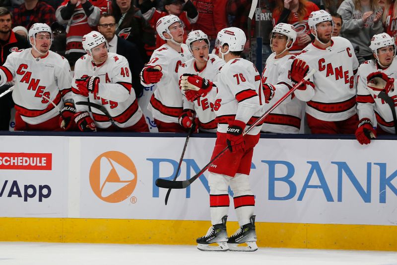 Feb 29, 2024; Columbus, Ohio, USA; Carolina Hurricanes defenseman Brady Skjei (76) celebrates his goal against the Columbus Blue Jackets during the second period at Nationwide Arena. Mandatory Credit: Russell LaBounty-USA TODAY Sports