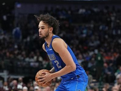 DALLAS, TX - DECEMBER 14: Dereck Lively II #2 of the Dallas Mavericks handles the ball during the game against the Minnesota Timberwolves on December 14, 2023 at the American Airlines Center in Dallas, Texas. NOTE TO USER: User expressly acknowledges and agrees that, by downloading and or using this photograph, User is consenting to the terms and conditions of the Getty Images License Agreement. Mandatory Copyright Notice: Copyright 2023 NBAE (Photo by Glenn James/NBAE via Getty Images)