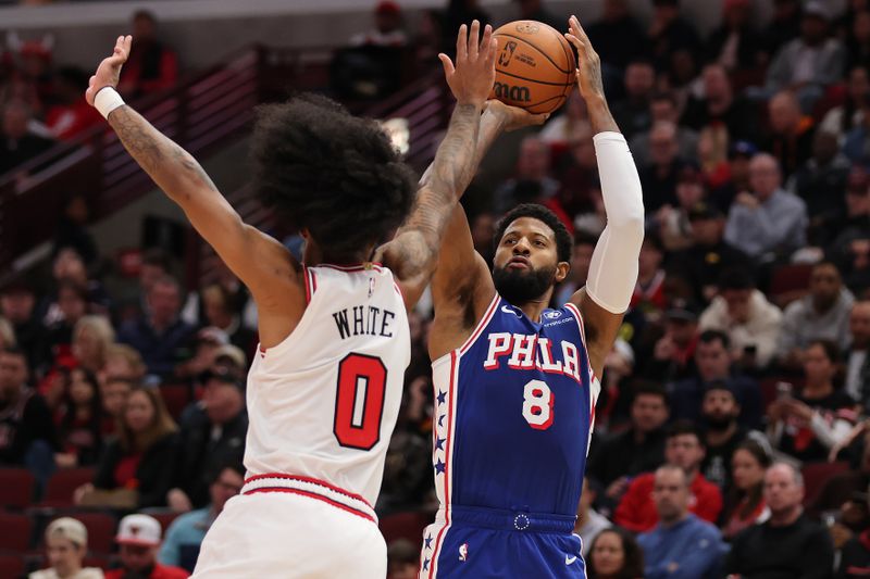 CHICAGO, ILLINOIS - DECEMBER 08: Paul George #8 of the Philadelphia 76ers shoots over Coby White #0 of the Chicago Bulls during the first half at the United Center on December 08, 2024 in Chicago, Illinois. NOTE TO USER: User expressly acknowledges and agrees that, by downloading and or using this photograph, User is consenting to the terms and conditions of the Getty Images License Agreement.  (Photo by Michael Reaves/Getty Images)