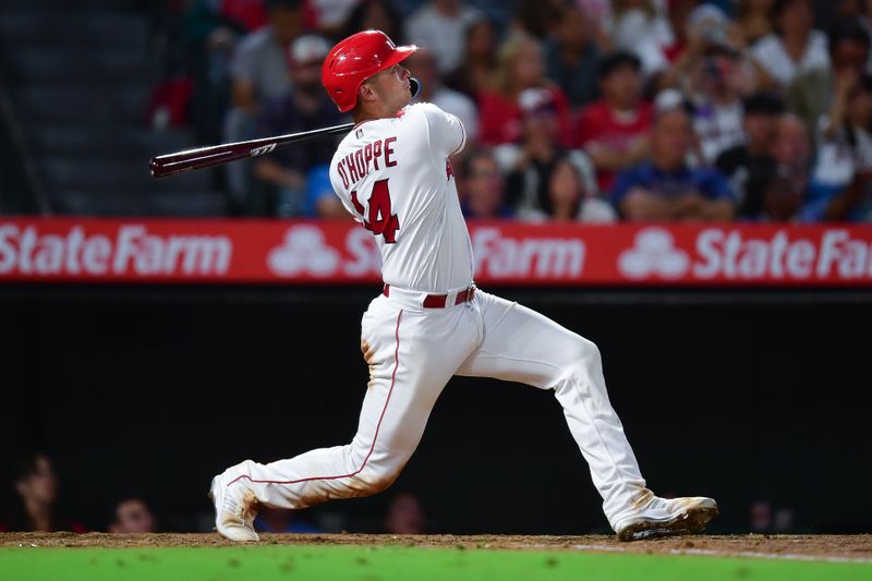 Sep 26, 2023; Anaheim, California, USA; Los Angeles Angels catcher Logan O'Hoppe (14) hits a single against the Texas Rangers during the fifth inning at Angel Stadium. Mandatory Credit: Gary A. Vasquez-USA TODAY Sports