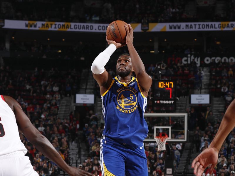 PORTLAND, OR - APRIL 11:  Kevon Looney #5 of the Golden State Warriors shoots the ball during the game  on April 11, 2024 at the Moda Center Arena in Portland, Oregon. NOTE TO USER: User expressly acknowledges and agrees that, by downloading and or using this photograph, user is consenting to the terms and conditions of the Getty Images License Agreement. Mandatory Copyright Notice: Copyright 2024 NBAE (Photo by Cameron Browne/NBAE via Getty Images)