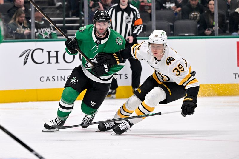 Jan 20, 2026; Dallas, Texas, USA;  Dallas Stars center Colin Blackwell (15) and Boston Bruins center Morgan Geekie (39) chase the puck during the first period at the American Airlines Center. Mandatory Credit: Jerome Miron-Imagn Images
