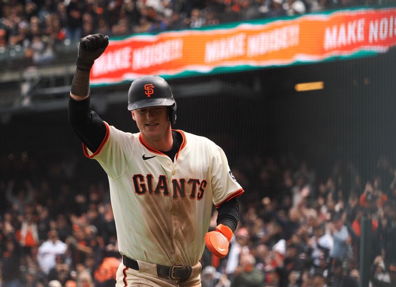Apr 24, 2025; San Francisco, California, USA; San Francisco Giants second baseman Tyler Fitzgerald (49) celebrates after scoring a run against the Milwaukee Brewers during the eighth inning at Oracle Park. Mandatory Credit: Kelley L Cox-Imagn Images