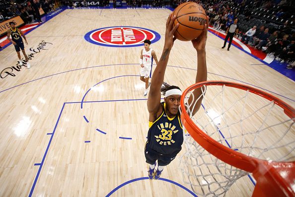 DETROIT, MI - DECEMBER 11: Myles Turner #33 of the Indiana Pacers dunks the ball during the game against the Detroit Pistons on December 11, 2023 at Little Caesars Arena in Detroit, Michigan. NOTE TO USER: User expressly acknowledges and agrees that, by downloading and/or using this photograph, User is consenting to the terms and conditions of the Getty Images License Agreement. Mandatory Copyright Notice: Copyright 2023 NBAE (Photo by Brian Sevald/NBAE via Getty Images)