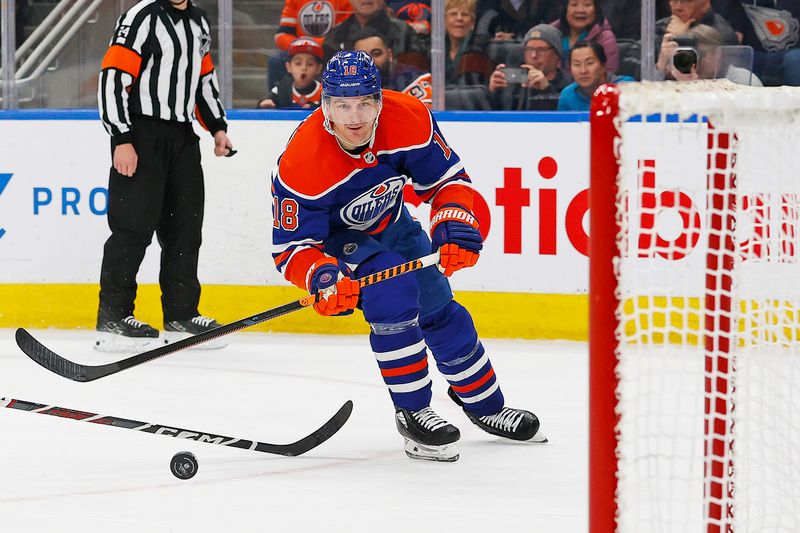 Jan 27, 2024; Edmonton, Alberta, CAN; Edmonton Oilers forward Zach Hyman (18) scores an empty net goal to clinch the Edmonton Oilers 16th straight win against the Nashville Predators at Rogers Place. Mandatory Credit: Perry Nelson-USA TODAY Sports