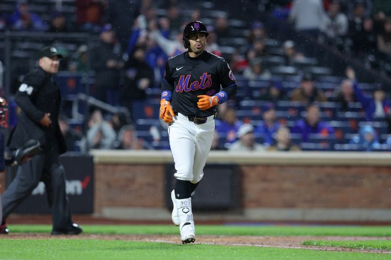 May 10, 2024; New York City, New York, USA; New York Mets shortstop Francisco Lindor (12) rounds the bases after hitting a solo home run against the Atlanta Braves during the seventh inning at Citi Field. Mandatory Credit: Brad Penner-USA TODAY Sports