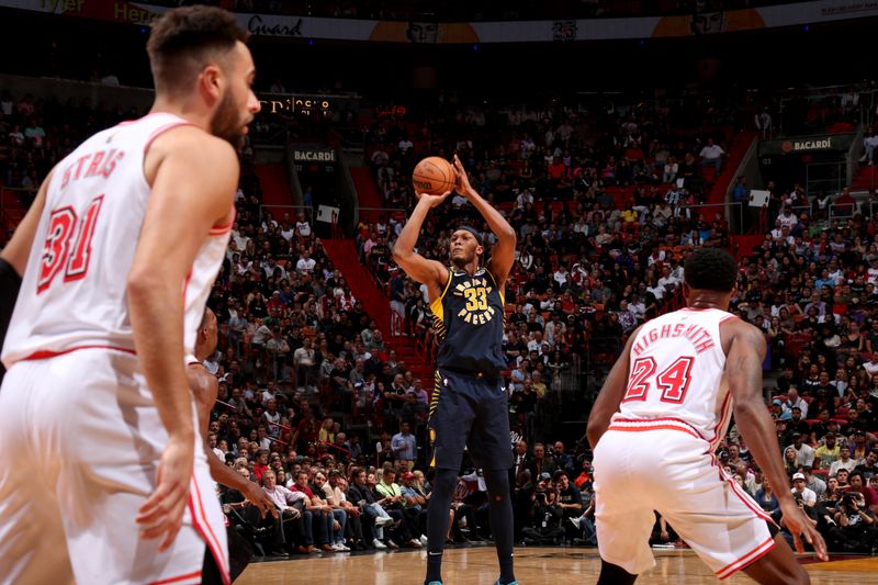 MIAMI, FL - FEBRUARY 8: Myles Turner #33 of the Indiana Pacers shoots the ball during the game against the Miami Heat on February 8, 2023 at Miami-Dade Arena in Miami, Florida. NOTE TO USER: User expressly acknowledges and agrees that, by downloading and or using this Photograph, user is consenting to the terms and conditions of the Getty Images License Agreement. Mandatory Copyright Notice: Copyright 2023 NBAE (Photo by Issac Baldizon/NBAE via Getty Images)