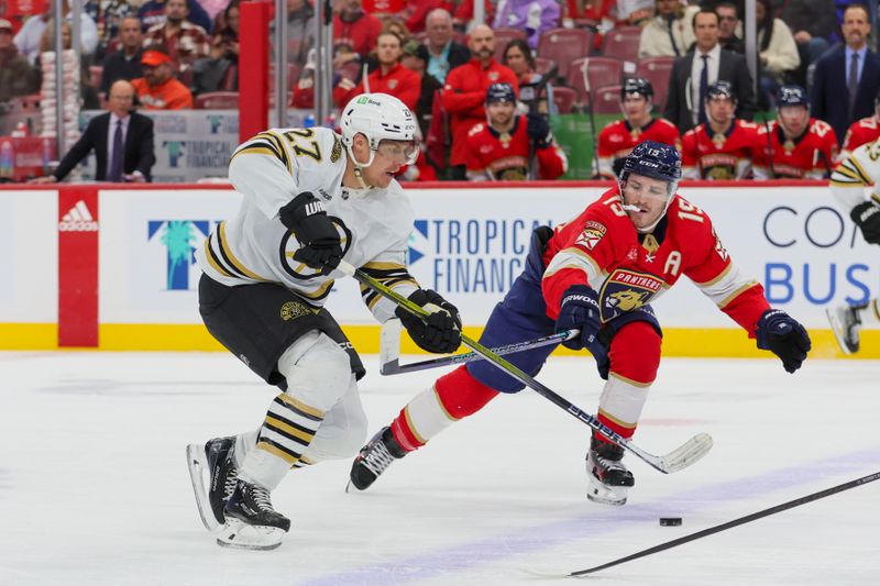 Nov 22, 2023; Sunrise, Florida, USA; Boston Bruins defenseman Hampus Lindholm (27) moves the puck against Florida Panthers center Anton Lundell (15) during the first period at Amerant Bank Arena. Mandatory Credit: Sam Navarro-USA TODAY Sports