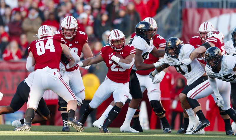 uNov 23, 2019; Madison, WI, USA; Wisconsin Badgers running back Jonathan Taylor (23) rushes with the football during the first quarter against the Purdue Boilermakers at Camp Randall Stadium. Mandatory Credit: Jeff Hanisch-USA TODAY Sports