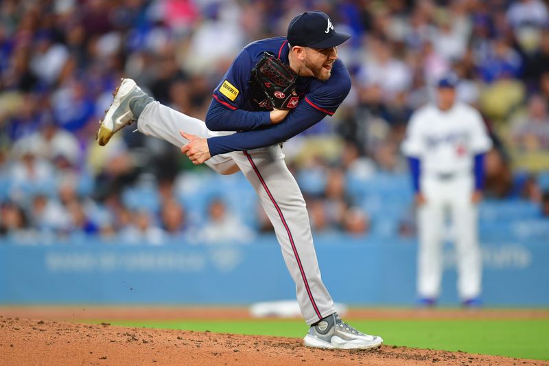 May 4, 2024; Los Angeles, California, USA; Atlanta Braves pitcher Dylan Lee (52) throws against the Los Angeles Dodgers during the fifth inning at Dodger Stadium. Mandatory Credit: Gary A. Vasquez-USA TODAY Sports