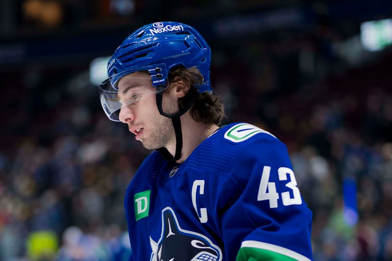 Mar 13, 2024; Vancouver, British Columbia, CAN; Vancouver Canucks defenseman Quinn Hughes (43) skates during warm up prior to a game against the Colorado Avalanche at Rogers Arena. Mandatory Credit: Bob Frid-USA TODAY Sports