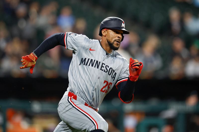 Apr 29, 2024; Chicago, Illinois, USA; Minnesota Twins outfielder Byron Buxton (25) runs to second base after hitting a double against the Chicago White Sox during the ninth inning at Guaranteed Rate Field. Mandatory Credit: Kamil Krzaczynski-USA TODAY Sports