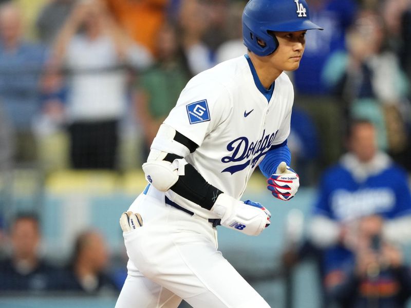 Apr 29, 2025; Los Angeles, California, USA; Los Angeles Dodgers designated hitter Shohei Ohtani (17) celebrates after hitting a home run during the first inning against the Miami Marlins at Dodger Stadium. Mandatory Credit: Kirby Lee-Imagn Images