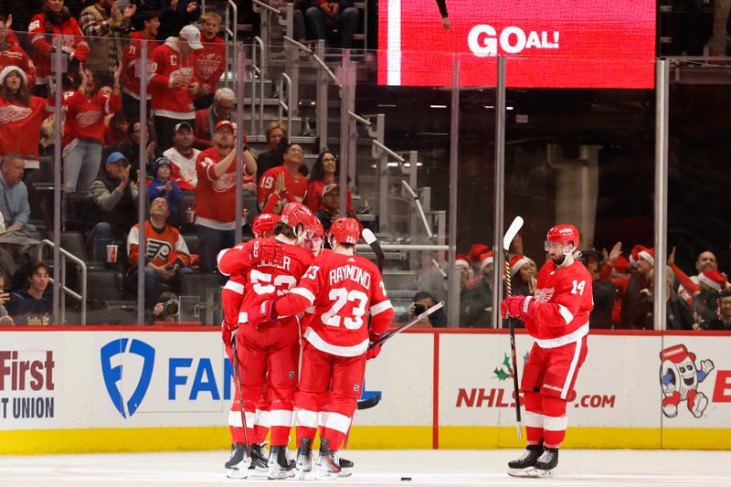 Dec 22, 2023; Detroit, Michigan, USA;  Detroit Red Wings celebrates a goal in the first period against the Philadelphia Flyers at Little Caesars Arena. Mandatory Credit: Rick Osentoski-USA TODAY Sports