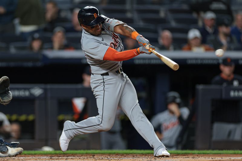 Sep 10, 2025; Bronx, New York, USA; Detroit Tigers third baseman Andy Ibanez (77) double during the second inning against the New York Yankees at Yankee Stadium. Mandatory Credit: Vincent Carchietta-Imagn Images