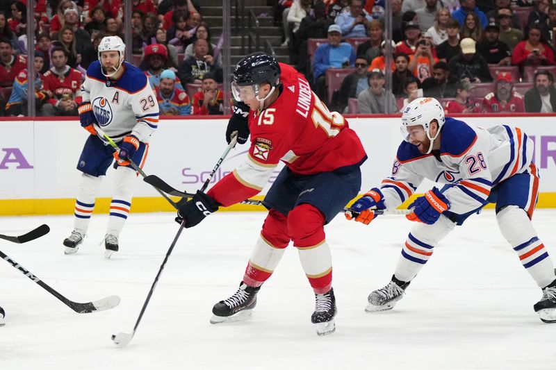 Nov 20, 2023; Sunrise, Florida, USA; Florida Panthers center Anton Lundell (15) shoots the puck against the Edmonton Oilers during the second period at Amerant Bank Arena. Mandatory Credit: Jasen Vinlove-USA TODAY Sports