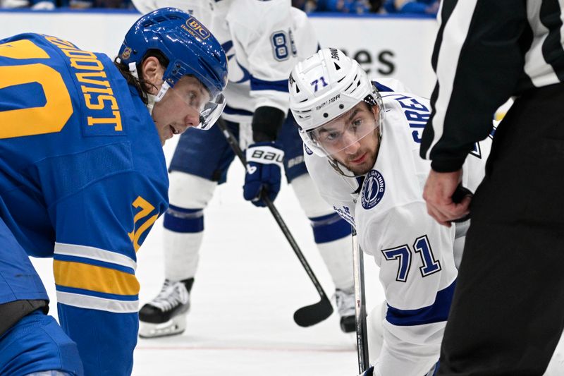 Jan 16, 2026; St. Louis, Missouri, USA; Tampa Bay Lightning center Anthony Cirelli (71) and St. Louis Blues center Oskar Sundqvist (70) wait for a face-off during the third period at Enterprise Center. Mandatory Credit: Jeff Le-Imagn Images