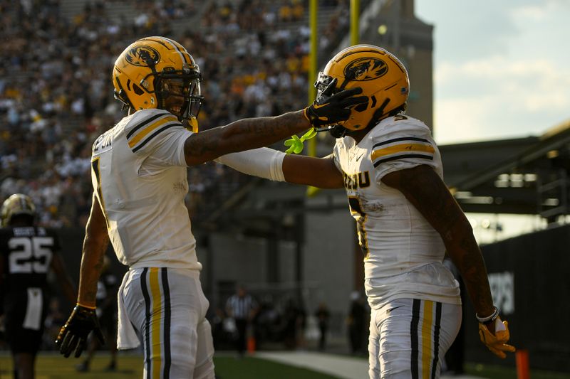 Sep 30, 2023; Nashville, Tennessee, USA;  Missouri Tigers wide receiver Theo Wease Jr. (1) celebrates the touchdown of wide receiver Luther Burden III (3) during the second half at FirstBank Stadium. Mandatory Credit: Steve Roberts-USA TODAY Sports