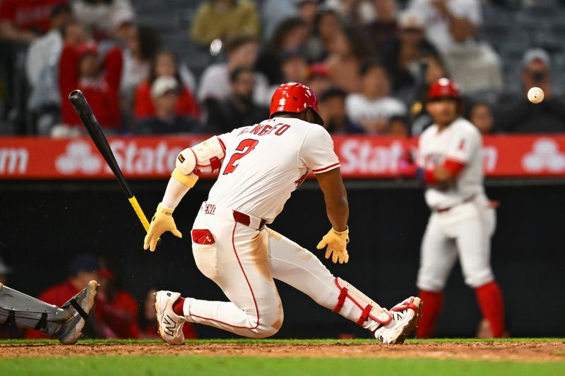 May 3, 2025; Anaheim, California, USA; Los Angeles Angels third baseman Luis Rengifo (2) is injured at bat against the Detroit Tigers during the eighth inning at Angel Stadium. Mandatory Credit: Jonathan Hui-Imagn Images