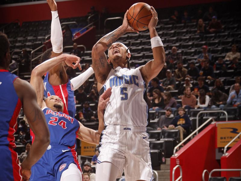 DETROIT, MI - FEBRUARY 4: Paolo Banchero #5 of the Orlando Magic drives to the basket during the game against the Detroit Pistons on February 4, 2024 at Little Caesars Arena in Detroit, Michigan. NOTE TO USER: User expressly acknowledges and agrees that, by downloading and/or using this photograph, User is consenting to the terms and conditions of the Getty Images License Agreement. Mandatory Copyright Notice: Copyright 2024 NBAE (Photo by Brian Sevald/NBAE via Getty Images)