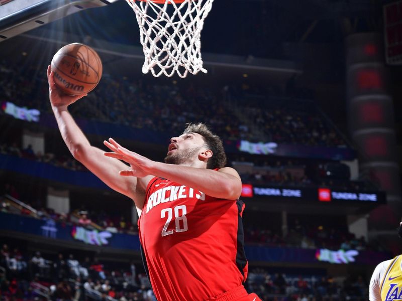 HOUSTON, TX - JANUARY 29: Alperen Sengun #28 of the Houston Rockets shoots the ball during the game against the Los Angeles Lakers  on January 29, 2024 at the Toyota Center in Houston, Texas. NOTE TO USER: User expressly acknowledges and agrees that, by downloading and or using this photograph, User is consenting to the terms and conditions of the Getty Images License Agreement. Mandatory Copyright Notice: Copyright 2024 NBAE (Photo by Logan Riely/NBAE via Getty Images)