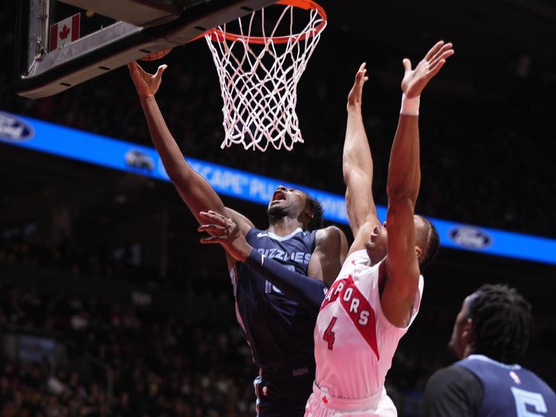 TORONTO, CANADA - JANUARY 22: Jaren Jackson Jr. #13 of the Memphis Grizzlies shoots the ball during the game against the Toronto Raptors on January 22, 2024 at the Scotiabank Arena in Toronto, Ontario, Canada.  NOTE TO USER: User expressly acknowledges and agrees that, by downloading and or using this Photograph, user is consenting to the terms and conditions of the Getty Images License Agreement.  Mandatory Copyright Notice: Copyright 2024 NBAE (Photo by Mark Blinch/NBAE via Getty Images)