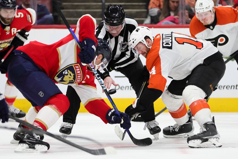 Feb 6, 2024; Sunrise, Florida, USA; Florida Panthers center Aleksander Barkov (16) and Philadelphia Flyers center Sean Couturier (14) face-off during the third period at Amerant Bank Arena. Mandatory Credit: Sam Navarro-USA TODAY Sports