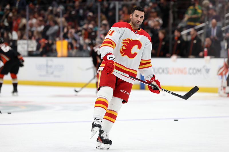 Dec 21, 2023; Anaheim, California, USA;  Calgary Flames center Nazem Kadri (91) warms up before the game against the Anaheim Ducks at Honda Center. Mandatory Credit: Kiyoshi Mio-USA TODAY Sports