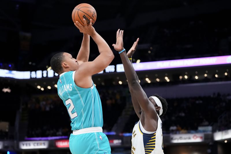 INDIANAPOLIS, INDIANA - OCTOBER 17: Grant Williams #2 of the Charlotte Hornets attempts a shot while being guarded by Pascal Siakam #43 of the Indiana Pacers in the second quarter during a preseason game at Gainbridge Fieldhouse on October 17, 2024 in Indianapolis, Indiana. NOTE TO USER: User expressly acknowledges and agrees that, by downloading and or using this photograph, User is consenting to the terms and conditions of the Getty Images License Agreement. (Photo by Dylan Buell/Getty Images)