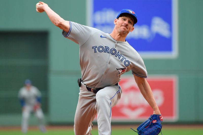 Jun 28, 2025; Boston, Massachusetts, USA;  Toronto Blue Jays starting pitcher Chris Bassitt (40) pitches during the first inning against the Boston Red Sox at Fenway Park. Mandatory Credit: Bob DeChiara-Imagn Images