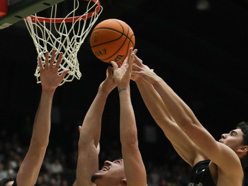 Feb 27, 2024; Fort Collins, Colorado, USA; Colorado State Rams forward Joel Scott (1) draws a fowl as he attempts a shot with Nevada Wolf Pack defending at Moby Arena. Mandatory Credit: Michael Madrid-USA TODAY Sports