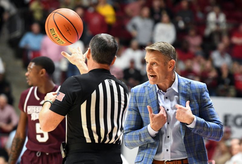 Feb 3, 2024; Tuscaloosa, Alabama, USA;  Alabama head coach Nate Oats protests to an official after another official hit him with a technical foul at Coleman Coliseum. Mandatory Credit: Gary Cosby Jr.-USA TODAY Sports