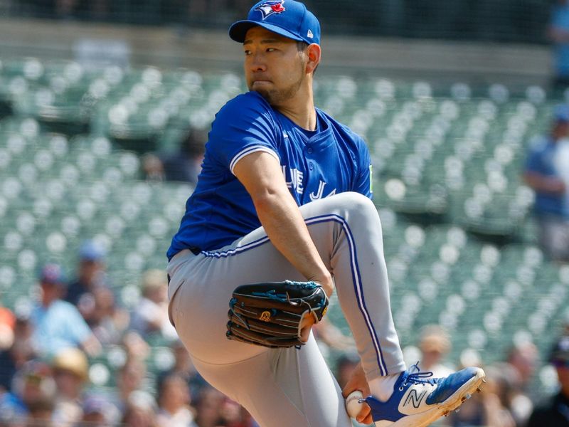 May 26, 2024; Detroit, Michigan, USA; Toronto Blue Jays starting pitcher Yusei Kikuchi (16) pitches during the first inning of the game against the Detroit Tigers at Comerica Park. Mandatory Credit: Brian Bradshaw Sevald-USA TODAY Sports