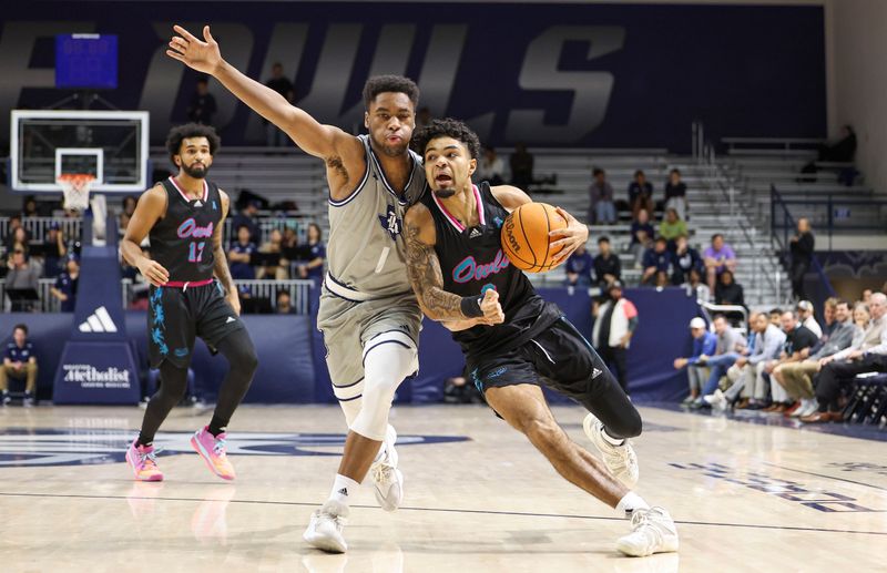 Jan 24, 2024; Houston, Texas, USA; Florida Atlantic Owls guard Nick Boyd (2) drives with the ball as Rice Owls guard Noah Shelby (1) defends during the first half at Tudor Fieldhouse. Mandatory Credit: Troy Taormina-USA TODAY Sports