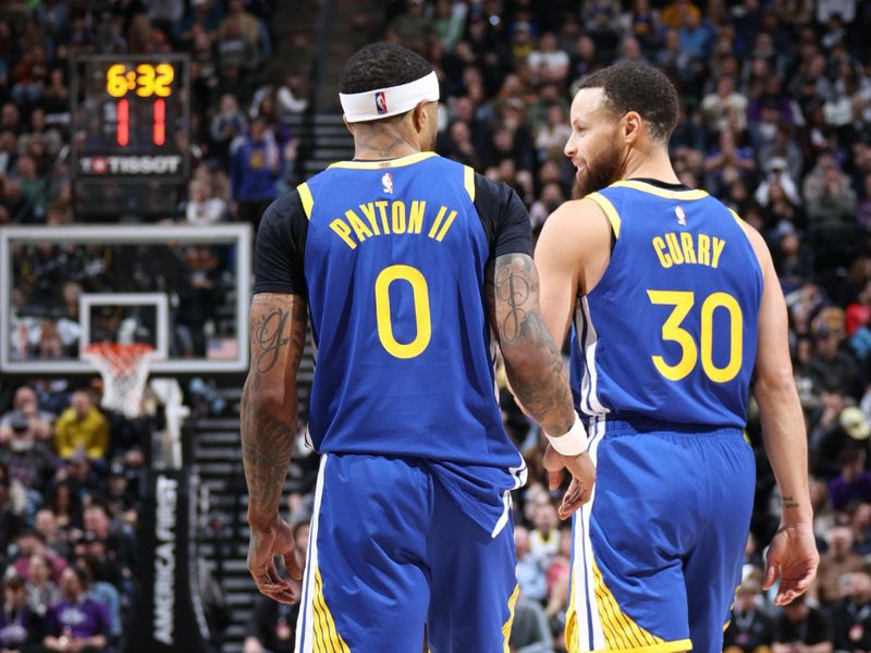 SALT LAKE CITY, UT - FEBRUARY 15: Gary Payton II #0 of the Golden State Warriors talks with Stephen Curry #30 during the game against the Utah Jazz on February 15, 2024 at Delta Center in Salt Lake City, Utah. NOTE TO USER: User expressly acknowledges and agrees that, by downloading and or using this Photograph, User is consenting to the terms and conditions of the Getty Images License Agreement. Mandatory Copyright Notice: Copyright 2024 NBAE (Photo by Melissa Majchrzak/NBAE via Getty Images)