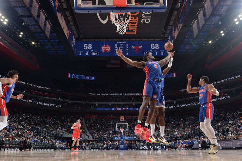 DETROIT, MI - APRIL 11: Jalen Duren #0 of the Detroit Pistons grabs a rebound during the game against the Chicago Bulls on April 11, 2024 at Little Caesars Arena in Detroit, Michigan. NOTE TO USER: User expressly acknowledges and agrees that, by downloading and/or using this photograph, User is consenting to the terms and conditions of the Getty Images License Agreement. Mandatory Copyright Notice: Copyright 2024 NBAE (Photo by Chris Schwegler/NBAE via Getty Images)