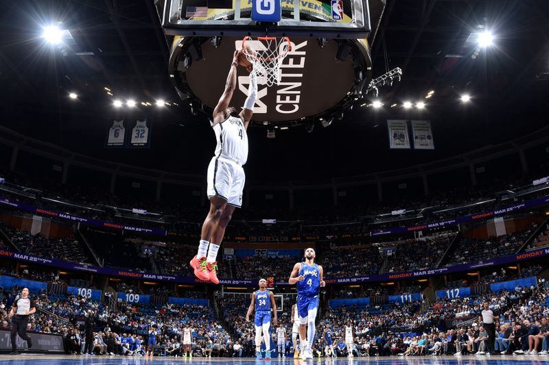 ORLANDO, FL - MARCH 13: Dennis Smith Jr. #4 of the Brooklyn Nets dunks the ball during the game against the Orlando Magic on March 13, 2024 at the Kia Center in Orlando, Florida. NOTE TO USER: User expressly acknowledges and agrees that, by downloading and or using this photograph, User is consenting to the terms and conditions of the Getty Images License Agreement. Mandatory Copyright Notice: Copyright 2024 NBAE (Photo by Fernando Medina/NBAE via Getty Images)