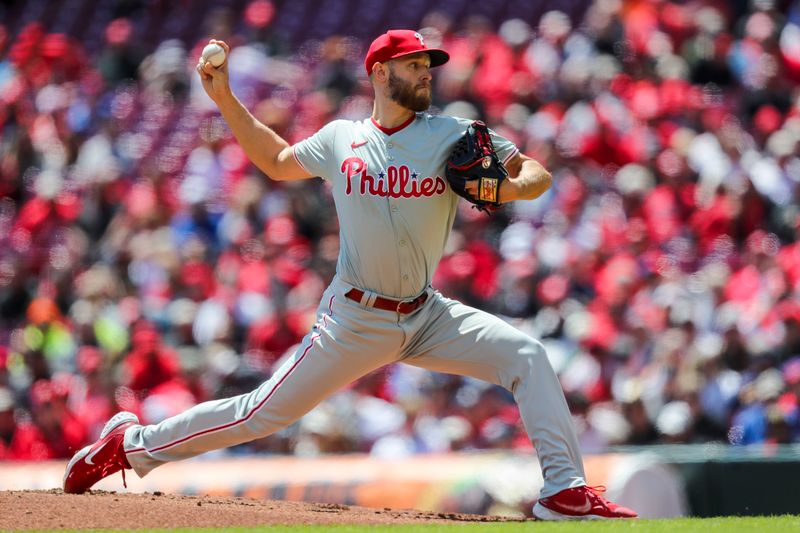 Apr 25, 2024; Cincinnati, Ohio, USA; Philadelphia Phillies starting pitcher Zack Wheeler (45) pitches against the Cincinnati Reds in the first inning at Great American Ball Park. Mandatory Credit: Katie Stratman-USA TODAY Sports