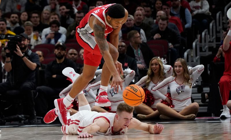 Mar 8, 2023; Chicago, IL, USA; Ohio State Buckeyes guard Roddy Gayle Jr. (1) steals the ball from Wisconsin Badgers forward Tyler Wahl (5) during the second half at United Center. Mandatory Credit: David Banks-USA TODAY Sports