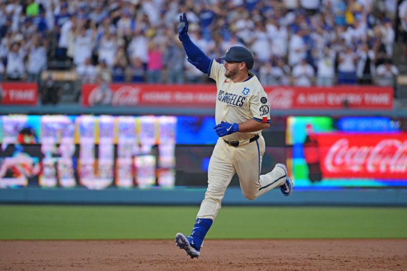 Sep 20, 2025; Los Angeles, California, USA; Los Angeles Dodgers third base Max Muncy (13) celebrates after scoring a two run home run during the second inning against the San Francisco Giants at Dodger Stadium. Mandatory Credit: Jayne Kamin-Oncea-Imagn Images