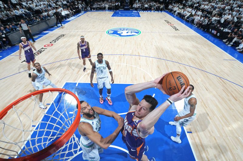 MINNEAPOLIS, MN -  APRIL 23: Drew Eubanks #14 of the Phoenix Suns dunks the ball during the game against the Minnesota Timberwolves during Round 1 Game 2 of the 2024 NBA Playoffs on April 23, 2024 at Target Center in Minneapolis, Minnesota. NOTE TO USER: User expressly acknowledges and agrees that, by downloading and or using this Photograph, user is consenting to the terms and conditions of the Getty Images License Agreement. Mandatory Copyright Notice: Copyright 2024 NBAE (Photo by David Sherman/NBAE via Getty Images)