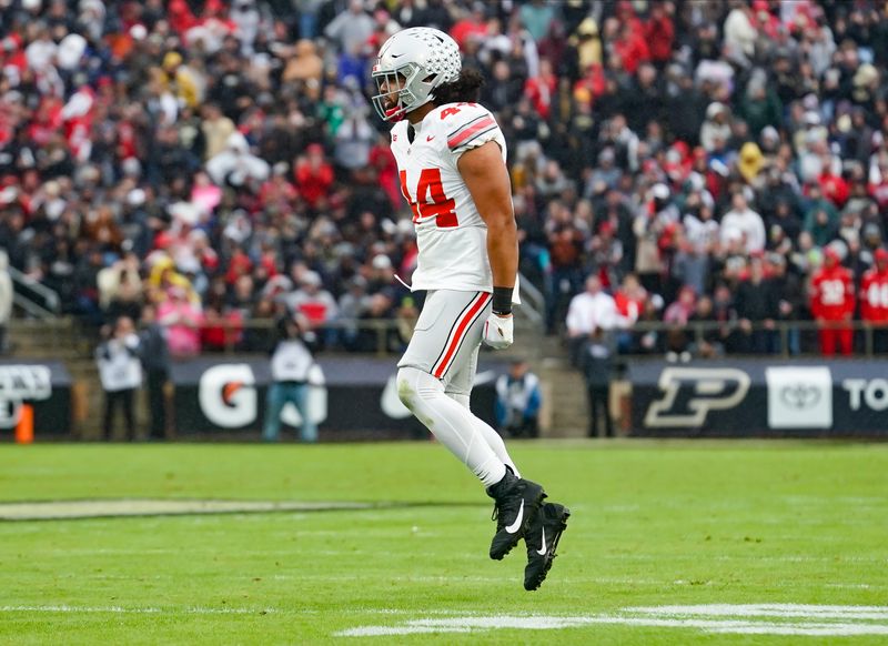 Oct 14, 2023; West Lafayette, Indiana, USA;  Ohio State Buckeyes defensive end JT Tuimoloau (44) celebrates after a play during the second half at Ross-Ade Stadium. Mandatory Credit: Robert Goddin-USA TODAY Sports