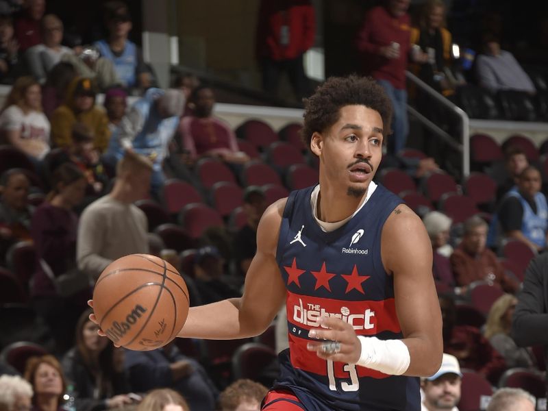 CLEVELAND, OH - DECEMBER 13: Jordan Poole #13 of the Washington Wizards dribbles the ball during the game against the Cleveland Cavaliers on December 13, 2024 at Rocket Mortgage FieldHouse in Cleveland, Ohio. NOTE TO USER: User expressly acknowledges and agrees that, by downloading and/or using this Photograph, user is consenting to the terms and conditions of the Getty Images License Agreement. Mandatory Copyright Notice: Copyright 2024 NBAE (Photo by David Liam Kyle/NBAE via Getty Images)