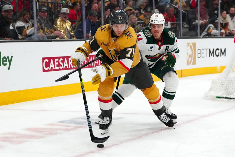 Apr 12, 2024; Las Vegas, Nevada, USA; Vegas Golden Knights center William Karlsson (71) skates ahead of Minnesota Wild center Joel Eriksson Ek (14) during the second period at T-Mobile Arena. Mandatory Credit: Stephen R. Sylvanie-USA TODAY Sports