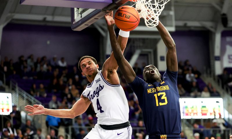 Feb 12, 2024; Fort Worth, Texas, USA;  TCU Horned Frogs guard Jameer Nelson Jr. (4) defends the shot by West Virginia Mountaineers forward Akok Akok (13) during the second half at Ed and Rae Schollmaier Arena. Mandatory Credit: Kevin Jairaj-USA TODAY Sports