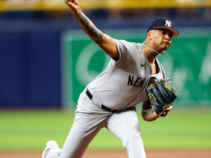 May 12, 2024; St. Petersburg, Florida, USA;  New York Yankees pitcher Luis Gil (81) throws a pitch against the Tampa Bay Rays in the first inning at Tropicana Field. Mandatory Credit: Nathan Ray Seebeck-USA TODAY Sports