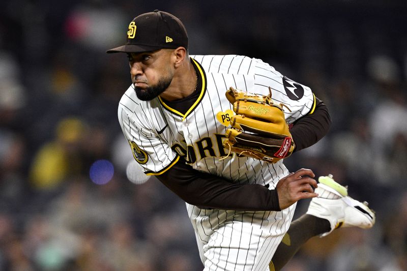 Apr 30, 2024; San Diego, California, USA; San Diego Padres relief pitcher Robert Suarez (75) throws a pitch against the Cincinnati Reds during the ninth inning at Petco Park. Mandatory Credit: Orlando Ramirez-USA TODAY Sports