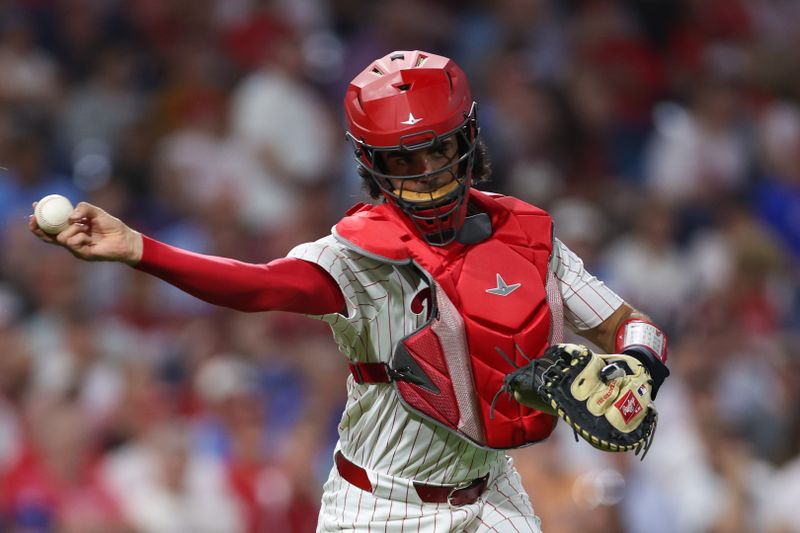 Sep 11, 2024; Philadelphia, Pennsylvania, USA; Philadelphia Phillies catcher Aramis Garcia (41) throws to first base for an out against the Tampa Bay Rays during the fourth inning at Citizens Bank Park. Mandatory Credit: Bill Streicher-Imagn Images